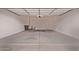 Spacious garage with epoxy flooring at 45722 W Sky Ln, Maricopa, AZ 85139
