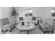 Bright living room featuring modern furnishings, stylish decor, and ample natural light at 45722 W Sky Ln, Maricopa, AZ 85139