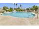 Inviting community pool with ample seating and lush landscaping, perfect for relaxation and recreation at 5111 N 83Rd St, Scottsdale, AZ 85250