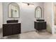 Luxurious bathroom with dual vanities and elegant mirrors offering a spa-like retreat at 529 E Taro Ln, Phoenix, AZ 85024