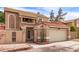 Two-story home featuring a red tile roof, stucco exterior, and well-kept landscaping at 529 E Taro Ln, Phoenix, AZ 85024