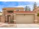 Two-story home featuring a red tile roof, stucco exterior, and well-kept landscaping at 529 E Taro Ln, Phoenix, AZ 85024