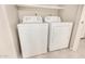 Functional laundry area with a washer and dryer, making chores a breeze in the home at 529 E Taro Ln, Phoenix, AZ 85024