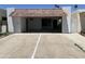 A covered two car carport with a tile roof and bright, fresh paint provides protected parking at 540 E Royal Palms Dr, Mesa, AZ 85203