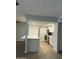 Modern kitchen features quartz countertops, stainless steel appliances and lots of white cabinets at 540 E Royal Palms Dr, Mesa, AZ 85203