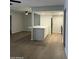 Open floor plan reveals updated kitchen featuring a breakfast bar and stainless appliances at 540 E Royal Palms Dr, Mesa, AZ 85203