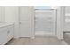 Elegant bathroom with a clear glass-doored shower and neutral color palette at 5549 S 246Th Ave, Buckeye, AZ 85326