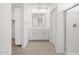 Modern bathroom features a double vanity, large mirror, and walk-in shower at 5549 S 246Th Ave, Buckeye, AZ 85326