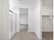 Bathroom featuring shower, and access to the bedroom and walk in closet at 5549 S 246Th Ave, Buckeye, AZ 85326