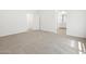 Spacious bedroom featuring carpet floors and an ensuite bathroom at 5549 S 246Th Ave, Buckeye, AZ 85326