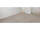 Bedroom showing neutral carpet and view of the ensuite bathroom at 5549 S 246Th Ave, Buckeye, AZ 85326