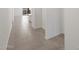 Bright entryway with neutral tile flooring, white walls, and seamless transition to living spaces at 5549 S 246Th Ave, Buckeye, AZ 85326
