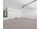 Garage featuring a water heater, utility connections, ample storage, and parking at 5549 S 246Th Ave, Buckeye, AZ 85326