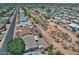 Wide aerial shot capturing the neighborhood, highlighting the density of homes and landscaping at 5932 E Colby St, Mesa, AZ 85205