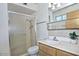 Updated bathroom featuring a shower, vanity, sink, and mirror at 5932 E Colby St, Mesa, AZ 85205
