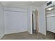 Bright bedroom with closet, providing ample storage space for a clutter-free environment at 5932 E Colby St, Mesa, AZ 85205