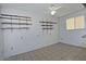 Bonus room has tile floors, window, and an industrial, modern design with plenty of space at 5932 E Colby St, Mesa, AZ 85205