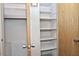 A glimpse of the closet featuring adjustable shelving for optimal storage and organization at 5932 E Colby St, Mesa, AZ 85205