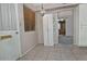 Neutral dining area featuring a window, tile flooring, and view into another room at 5932 E Colby St, Mesa, AZ 85205