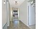 Inviting entryway boasts wood-look floors and a door with decorative glass panels at 5932 E Colby St, Mesa, AZ 85205