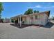 View of the side of a home with a covered patio area for enjoying the outdoors at 5932 E Colby St, Mesa, AZ 85205