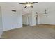 Spacious living room with neutral carpet and lighting fixtures at 5932 E Colby St, Mesa, AZ 85205