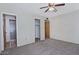 Spacious main bedroom including carpet, a closet, and an en suite bathroom at 5932 E Colby St, Mesa, AZ 85205