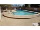 Inviting community pool with lounge chairs for relaxing on a sunny day at 5932 E Colby St, Mesa, AZ 85205