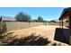 Spacious backyard with block fence offers privacy and space to create an oasis at 6504 W Cochise Dr, Glendale, AZ 85302