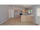 Bright kitchen featuring stainless steel appliances and a breakfast bar at 6504 W Cochise Dr, Glendale, AZ 85302