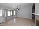 Living room featuring ceramic tile, natural light and an elegant ceiling fan at 6504 W Cochise Dr, Glendale, AZ 85302
