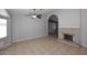 Spacious living room with tile floors, fireplace, and lots of natural light at 6504 W Cochise Dr, Glendale, AZ 85302