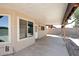 Covered patio offers a spot to sit and enjoy the fenced backyard and Arizona sun at 6504 W Cochise Dr, Glendale, AZ 85302