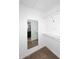 Walk-in closet boasts built-in shelving and mirrored wall, adding style and functionality at 6504 W Cochise Dr, Glendale, AZ 85302