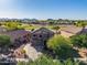 Beautiful aerial shot of a home on a golf course with desert mountain views at 654 E Taylor Trl, San Tan Valley, AZ 85143