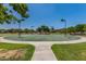 Outdoor basketball court surrounded by lush greenery, providing a recreational space for residents at 654 E Taylor Trl, San Tan Valley, AZ 85143