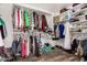 Walk-in closet with ample storage space, including shelving and hanging rods at 654 E Taylor Trl, San Tan Valley, AZ 85143