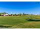 View of a well-maintained golf course, showcasing the community's recreational amenities at 654 E Taylor Trl, San Tan Valley, AZ 85143
