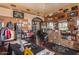 Well-stocked golf shop with apparel, equipment, and accessories displayed on wooden floors at 654 E Taylor Trl, San Tan Valley, AZ 85143