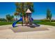 Community playground area with lake views at 654 E Taylor Trl, San Tan Valley, AZ 85143