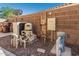 Pool equipment including pump, filter, plumbing and electrical components along exterior wall at 654 E Taylor Trl, San Tan Valley, AZ 85143