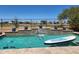 Backyard swimming pool featuring a water feature and a view of the surrounding golf course at 654 E Taylor Trl, San Tan Valley, AZ 85143