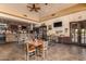Casual restaurant with tables, chairs, bar, and multiple televisions for entertainment at 654 E Taylor Trl, San Tan Valley, AZ 85143