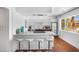 Modern kitchen with a granite countertop island, stainless steel appliances, and sleek cabinetry, perfect for cooking and entertaining at 6906 E 4Th St # 4, Scottsdale, AZ 85251