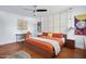 Nicely decorated main bedroom with an adjacent workspace, modern decor, and neutral wall art at 6906 E 4Th St # 4, Scottsdale, AZ 85251