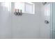 Shower interior featuring a window and dispensers at 6906 E 4Th St # 4, Scottsdale, AZ 85251