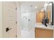 Modern bathroom featuring a walk-in shower, double sinks, and contemporary fixtures at 7127 N 79Th St, Scottsdale, AZ 85258