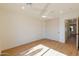 Bedroom boasts a ceiling fan, recessed lights, wood floors, and a closet with sliding doors at 7127 N 79Th St, Scottsdale, AZ 85258