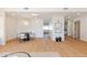 Dining area featuring modern table with seating, recessed lighting, and light-colored wood flooring throughout at 7127 N 79Th St, Scottsdale, AZ 85258