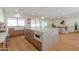 Well-equipped kitchen with an island, sleek countertops, and seamless open layout to living area at 7127 N 79Th St, Scottsdale, AZ 85258